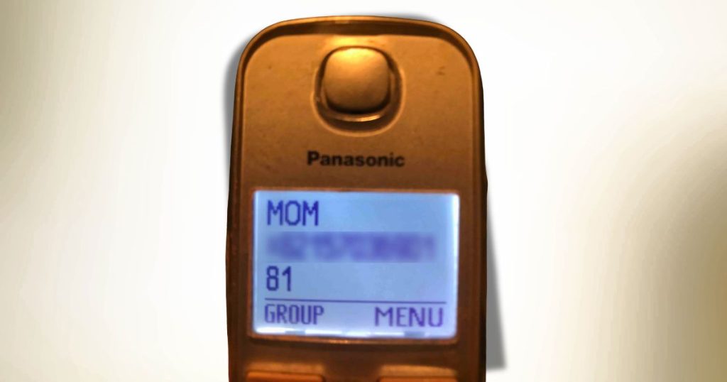 Caller ID on a Panasonic landline phone showing 'Mom' with a disconnected number, interpreted as a possible afterlife message.